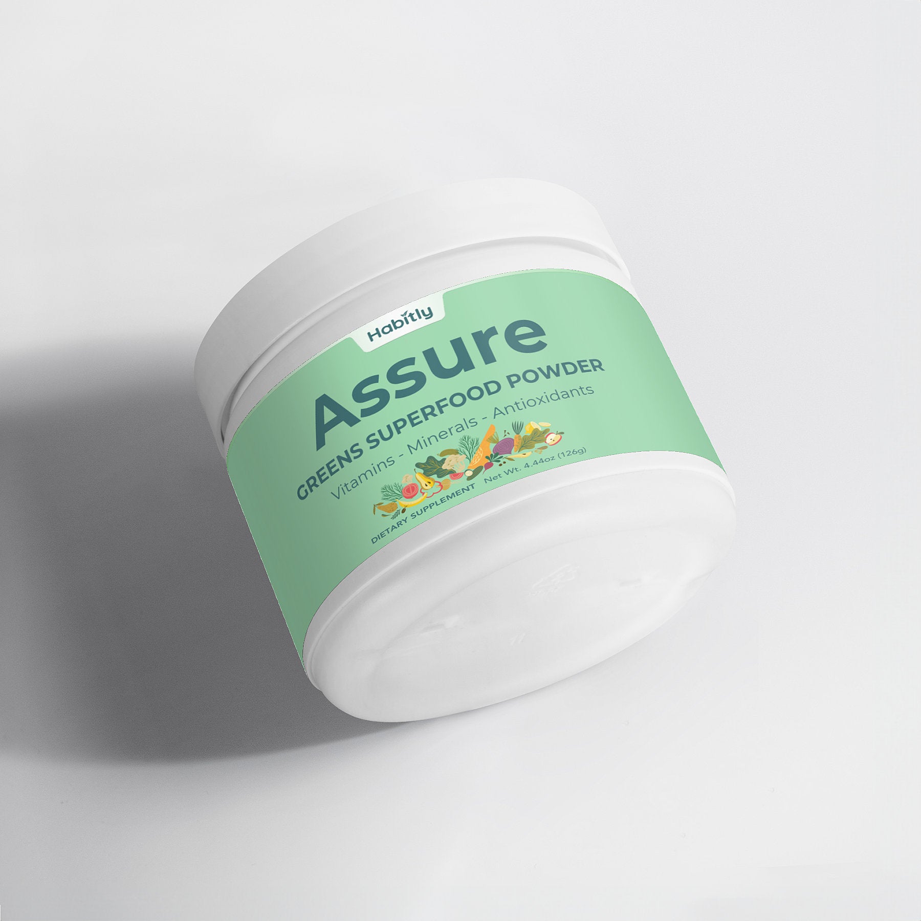 A container showcases a green label with the text &quot;Assure Greens Superfood Powder,&quot; emphasizing the nourishing qualities of Spirulina. The design prominently features &quot;Vitamins • Minerals • Antioxidants,&quot; alongside illustrations of colorful vegetables and fruits, with the brand name &quot;Habitly&quot; at the top.