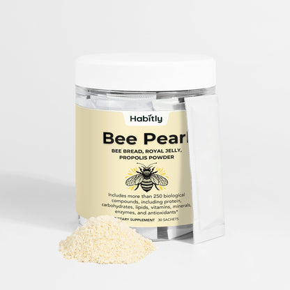 A jar of &quot;Bee Pearl Concentrated Bee Bread Powder&quot; by Habitly features bee bread, royal jelly, and propolis. The label emphasizes the presence of over 250 biological compounds, accompanied by a small pile of the nutrient-rich powder outside the jar.