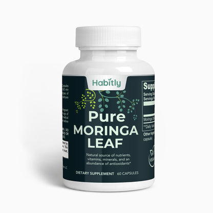 A white bottle labeled &quot;Habitly Pure Moringa Leaf Capsules&quot; contains 60 capsules, emphasizing its function as a dietary supplement. The packaging highlights the presence of nutrients, vitamins, minerals, and antioxidants. The label includes a leaf design, a vegan symbol, and dosage instructions.