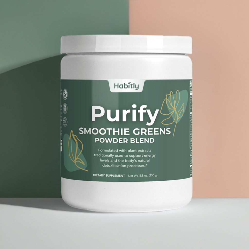 A white container labeled &quot;Habitly Purify Smoothie Greens Powder&quot; is shown against a two-tone backdrop of green and peach. Enriched with the goodness of a superfoods blend, the label includes illustrations of leaves along with detailed product information.